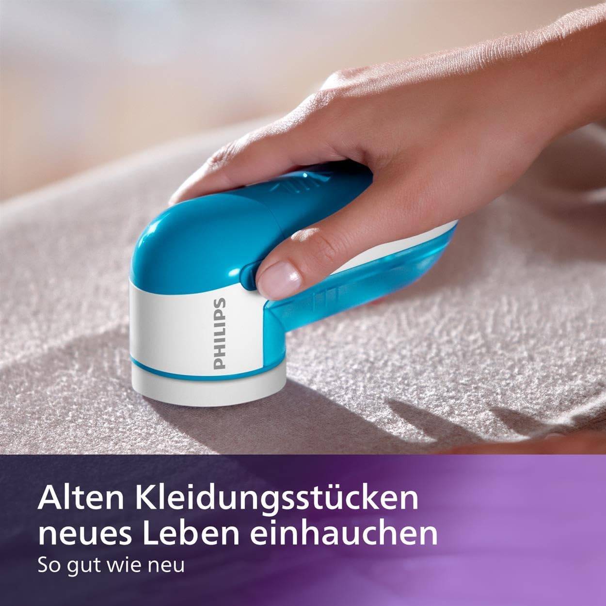 Philips Fusselrasierer – Fusselentferner für Kleidungsstücke, geeignet für alle Textilien, 2 Höheneinstellungen, batteriebetrieben, blau (GC026/00) – Bild 3